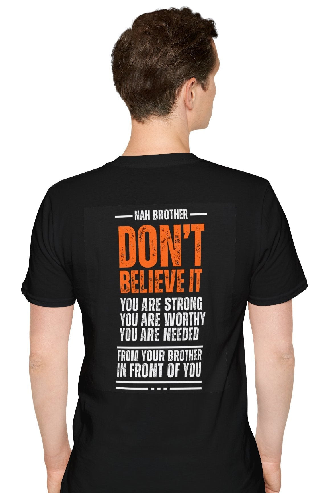 Black t-shirt with motivational message on the back worn by a person, white background
