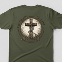 Green t-shirt with a cross design and text on the back against a light gray background