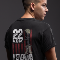 Person wearing a black t-shirt with '22 A Day Veteran Lives Matter' design on the back.