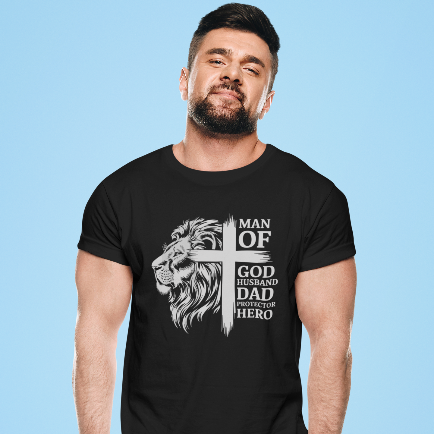 Man wearing a black t-shirt with a lion graphic and text on a blue background